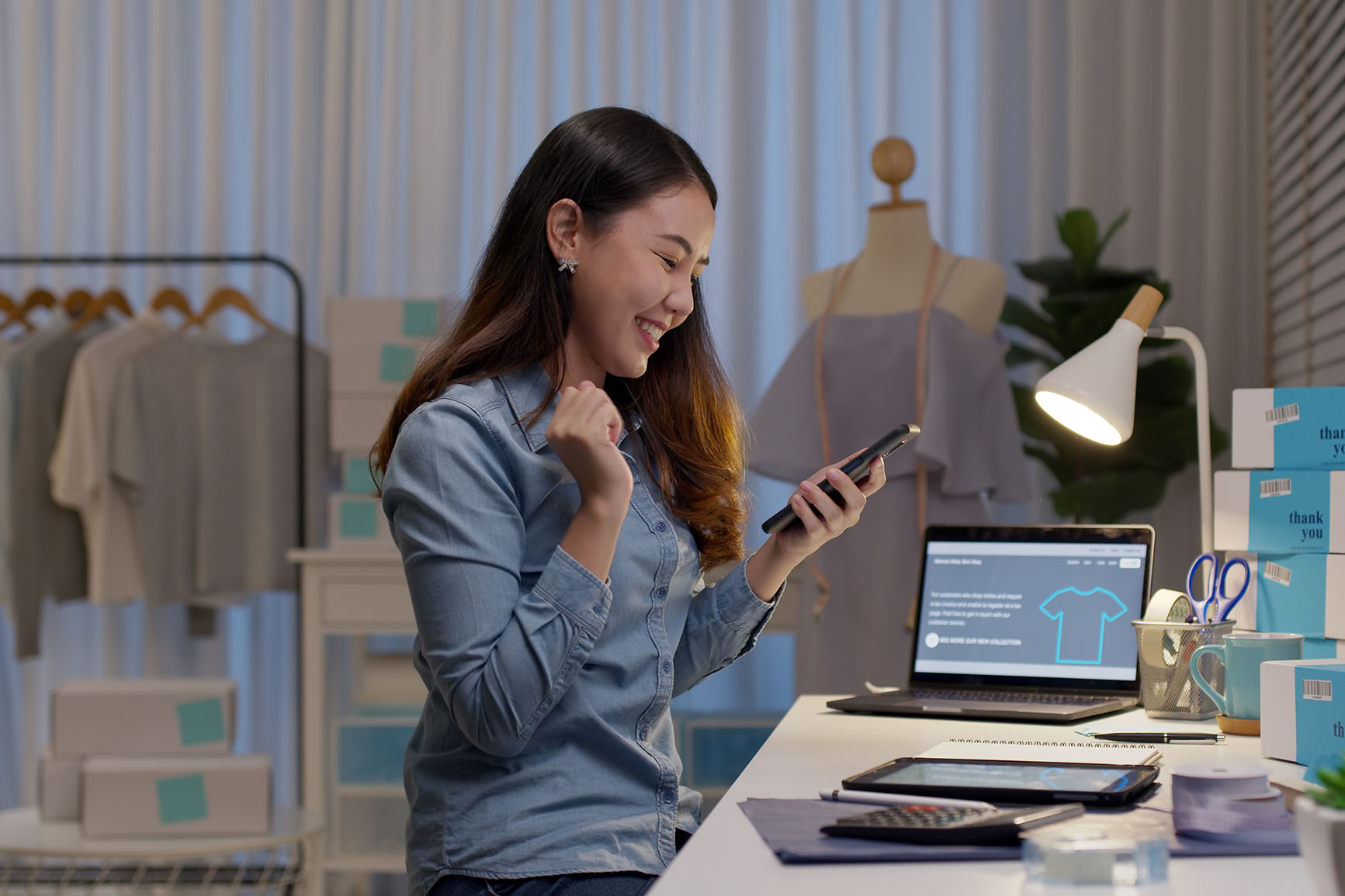 two people looking at digital metrics on a computer