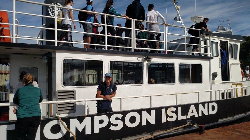 Elissa on the ferry that students and volunteers take to visit the island